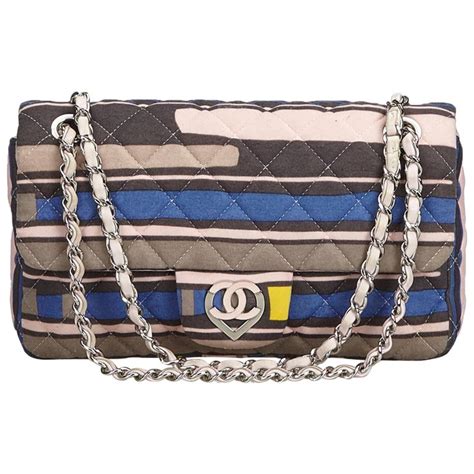 chanel bag with heart clasp|More.